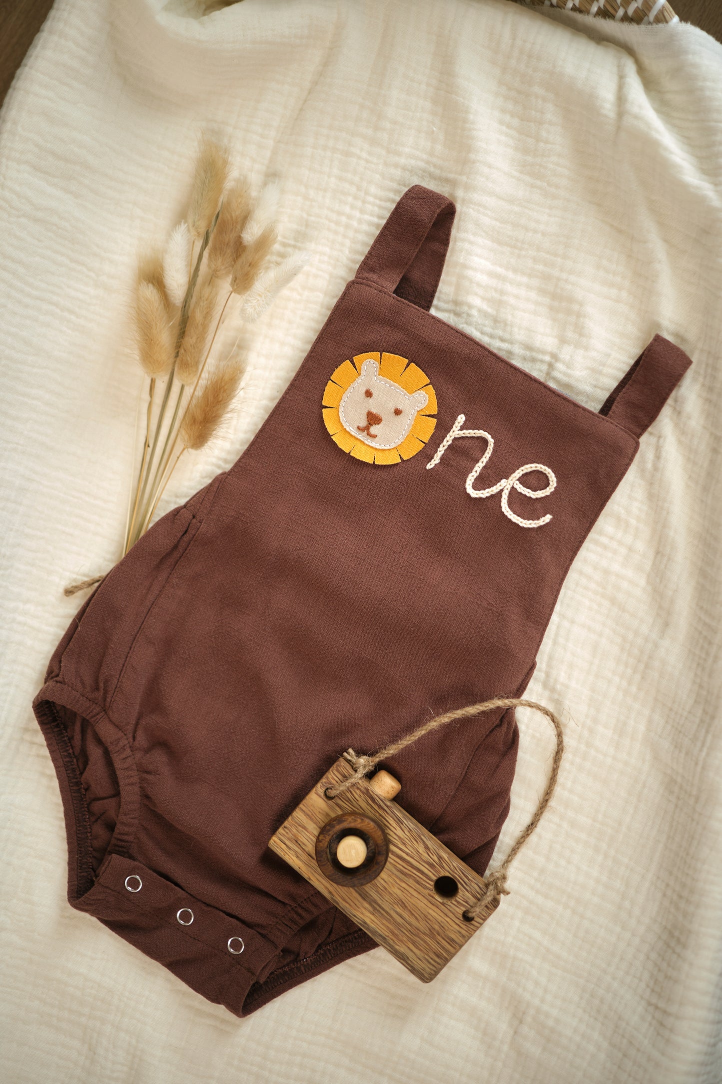 "One" Hand Embroidered Boy Romper samples